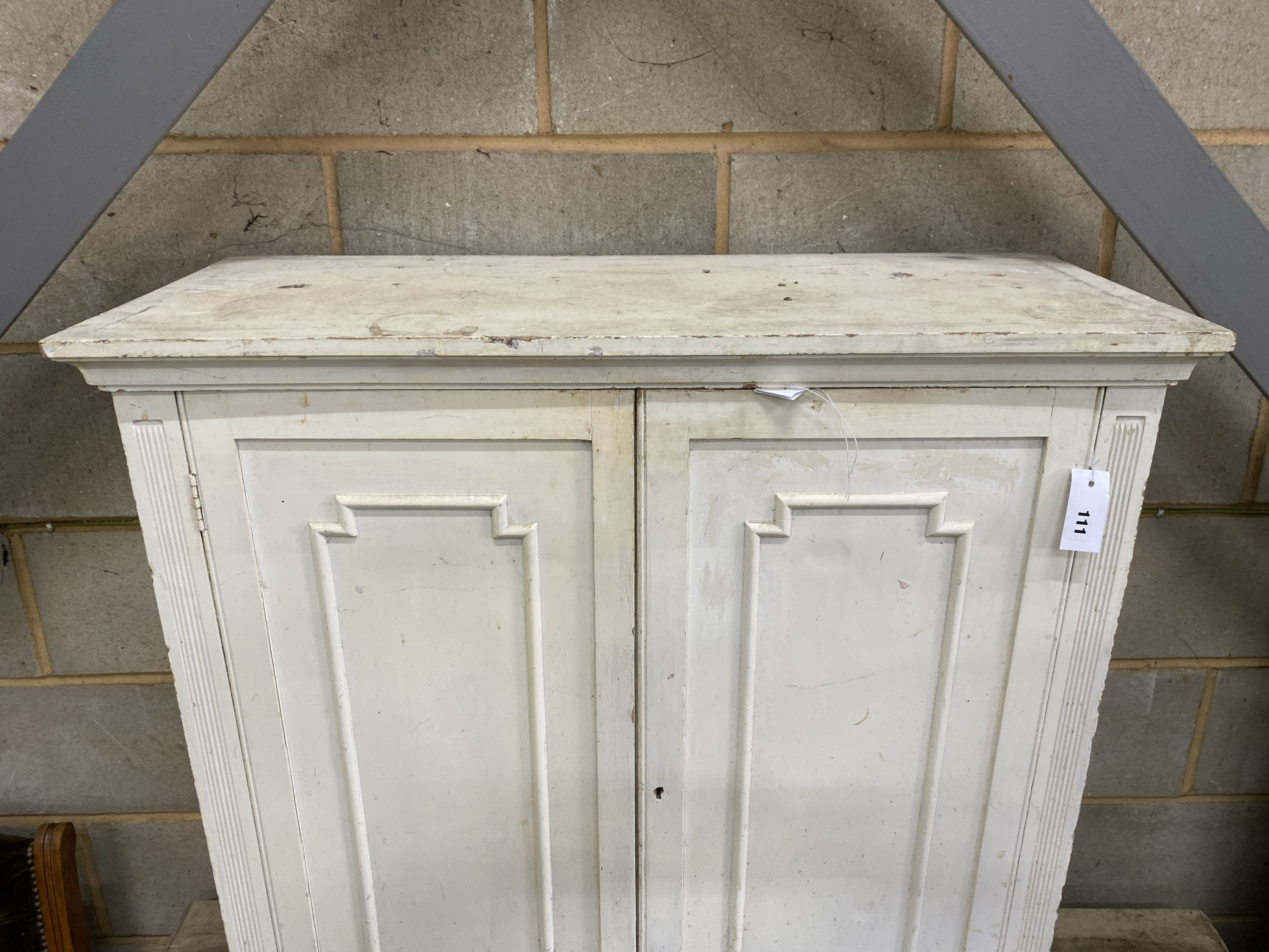An early 20th century painted two door side cabinet, width 92cm, depth 39cm, height 91cm